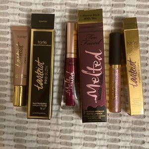 BRAND NEW NEVER USED highlighter , liquid lipstick , shimmering lip gloss
